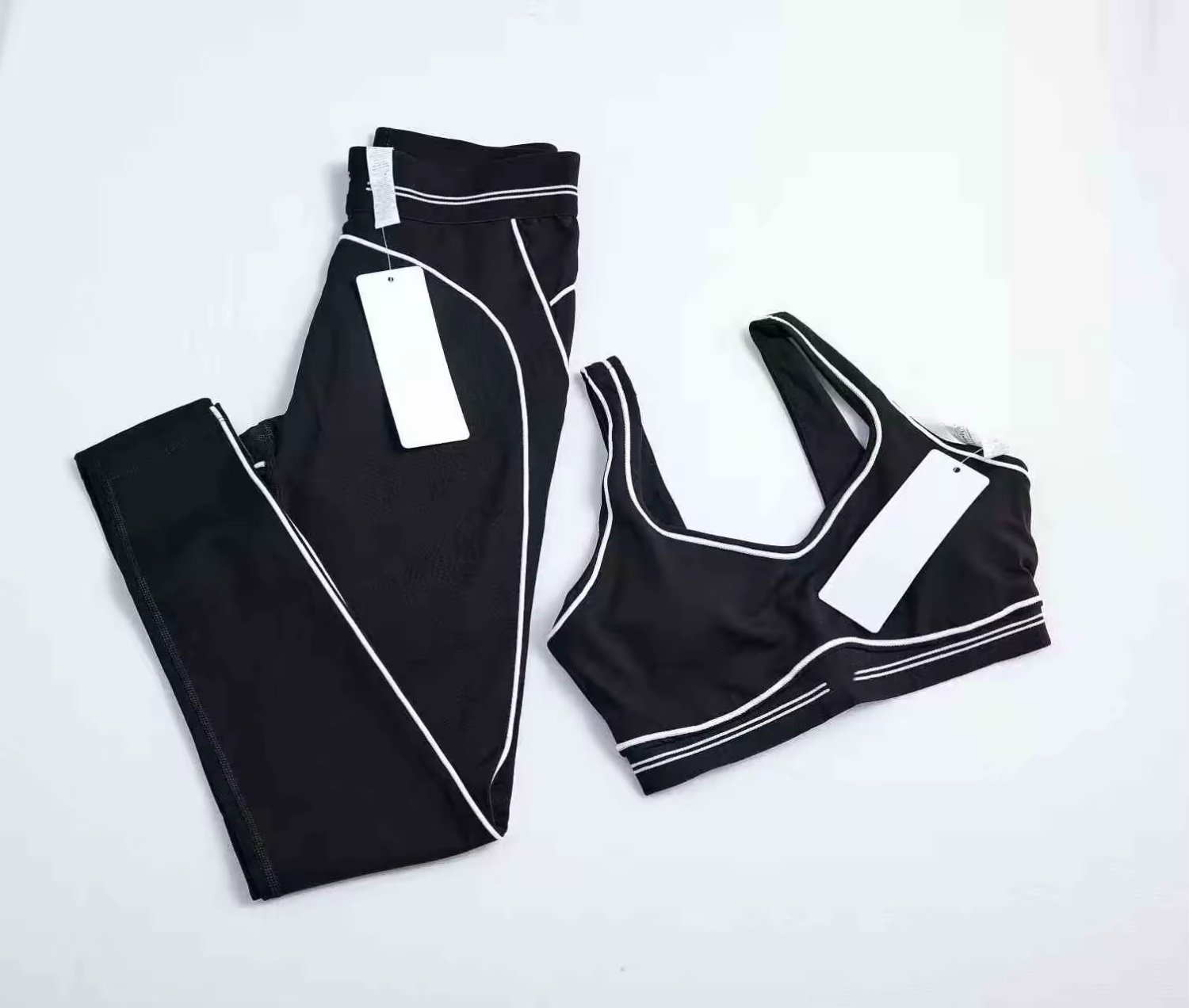 Wholesale fashion yoga Pilates elastic seamless ribbed high-quality leggings 2-piece set for women